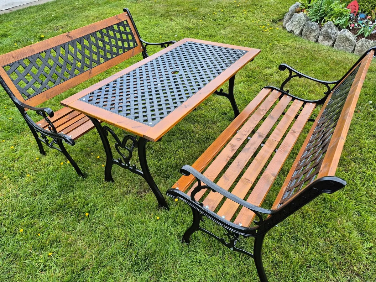 Cast iron table and benches - Image 3