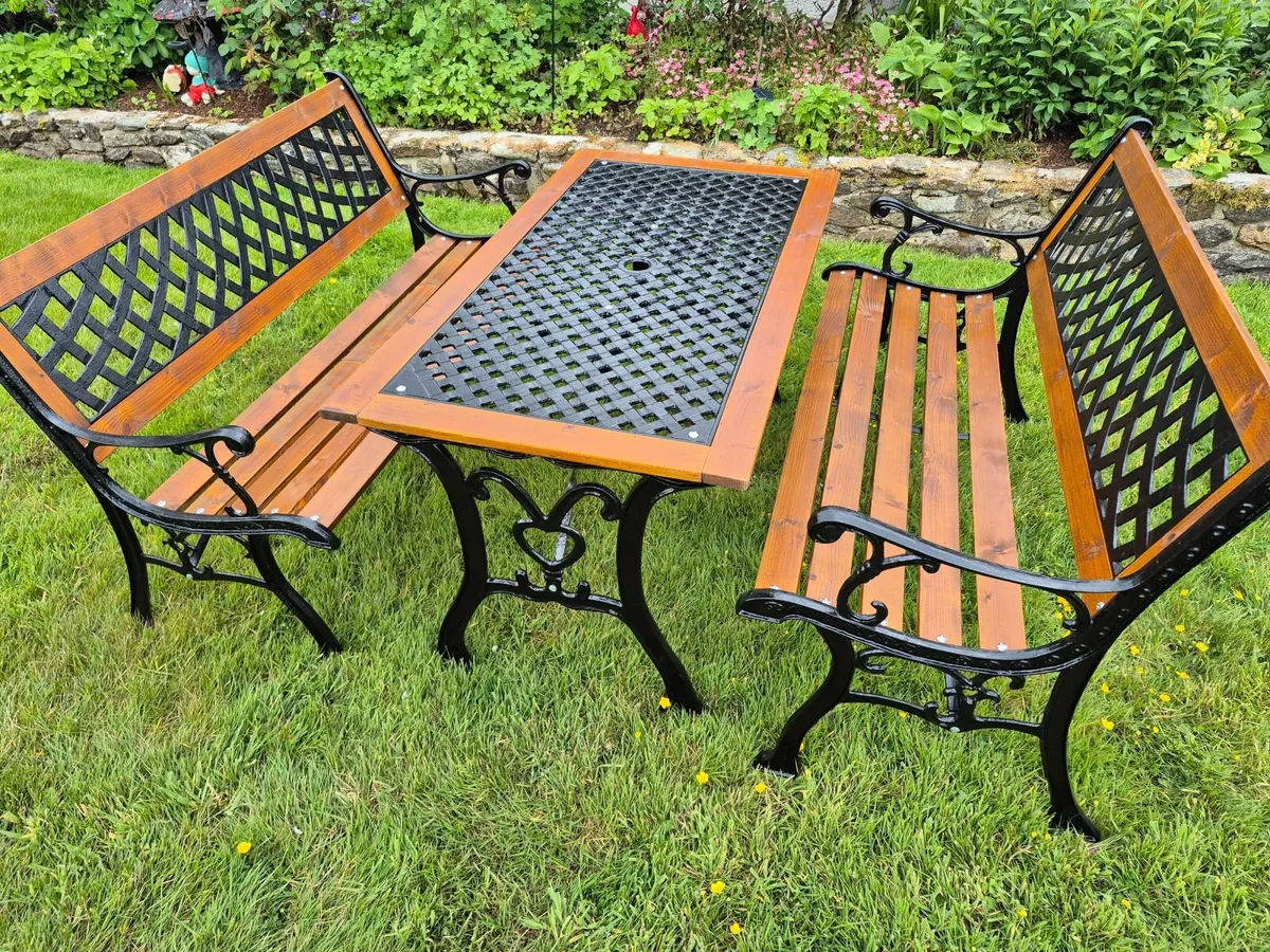 Cast iron table and benches - Image 1
