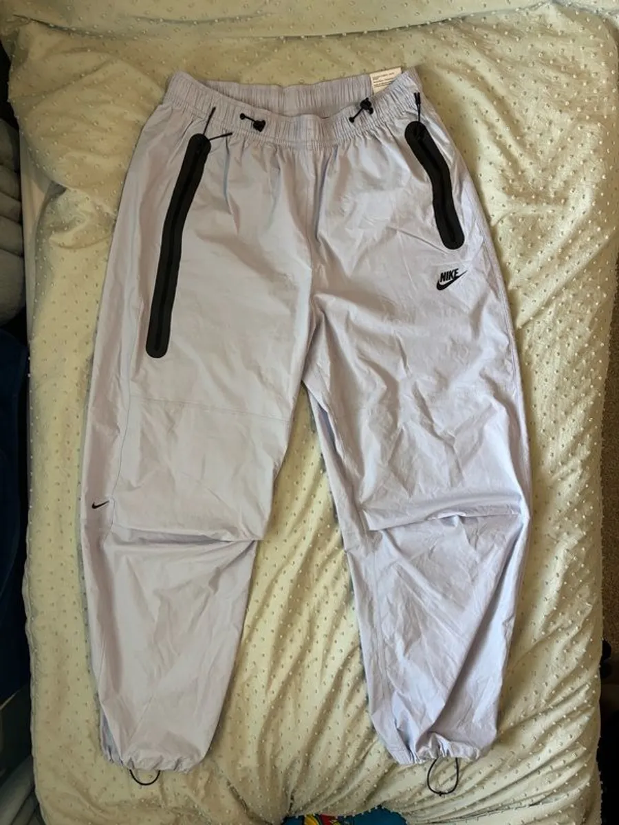 Nike Tech Woven Oversized Pants - Image 1