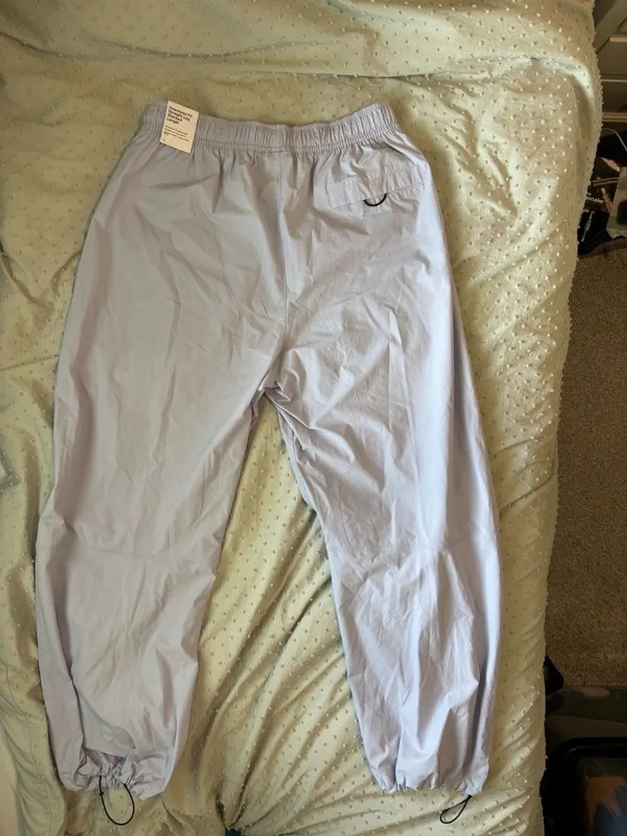 Nike Tech Woven Oversized Pants - Image 2