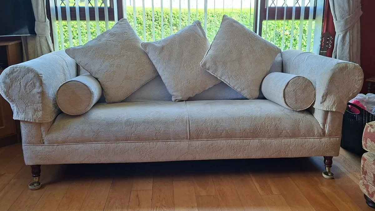 Cream Sofa with boulsters and cushions - Image 1