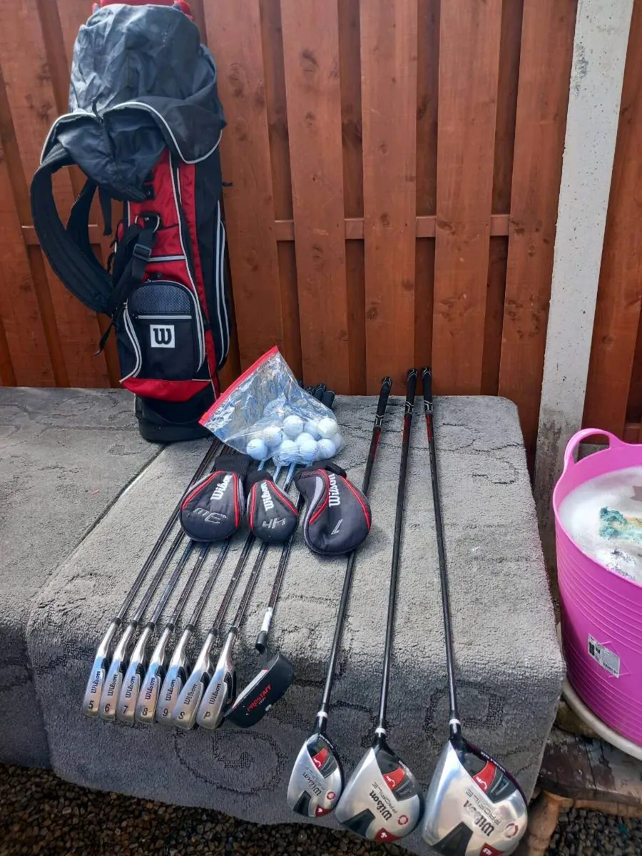 Wilson golf clubs and bag with stand. - Image 2