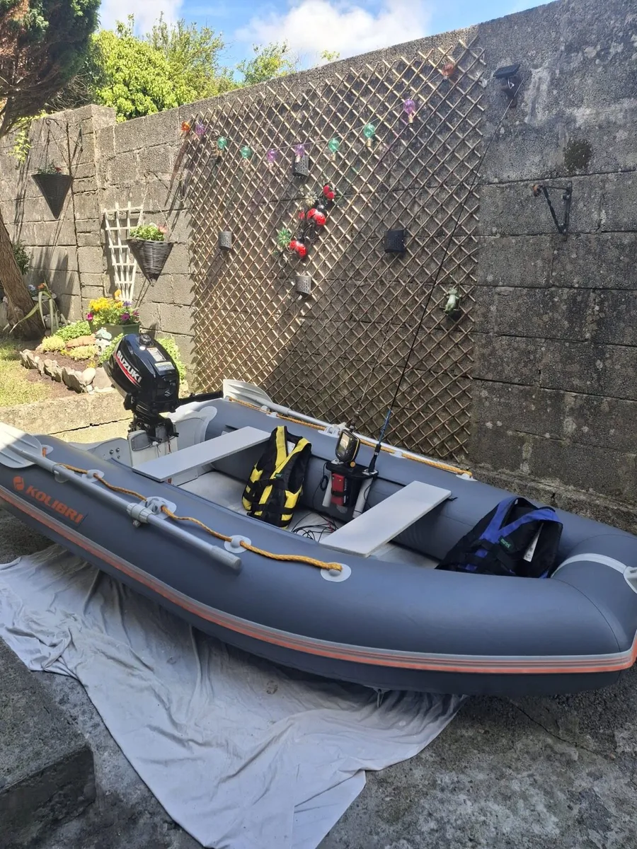 Inflatable boat with engine - Image 2