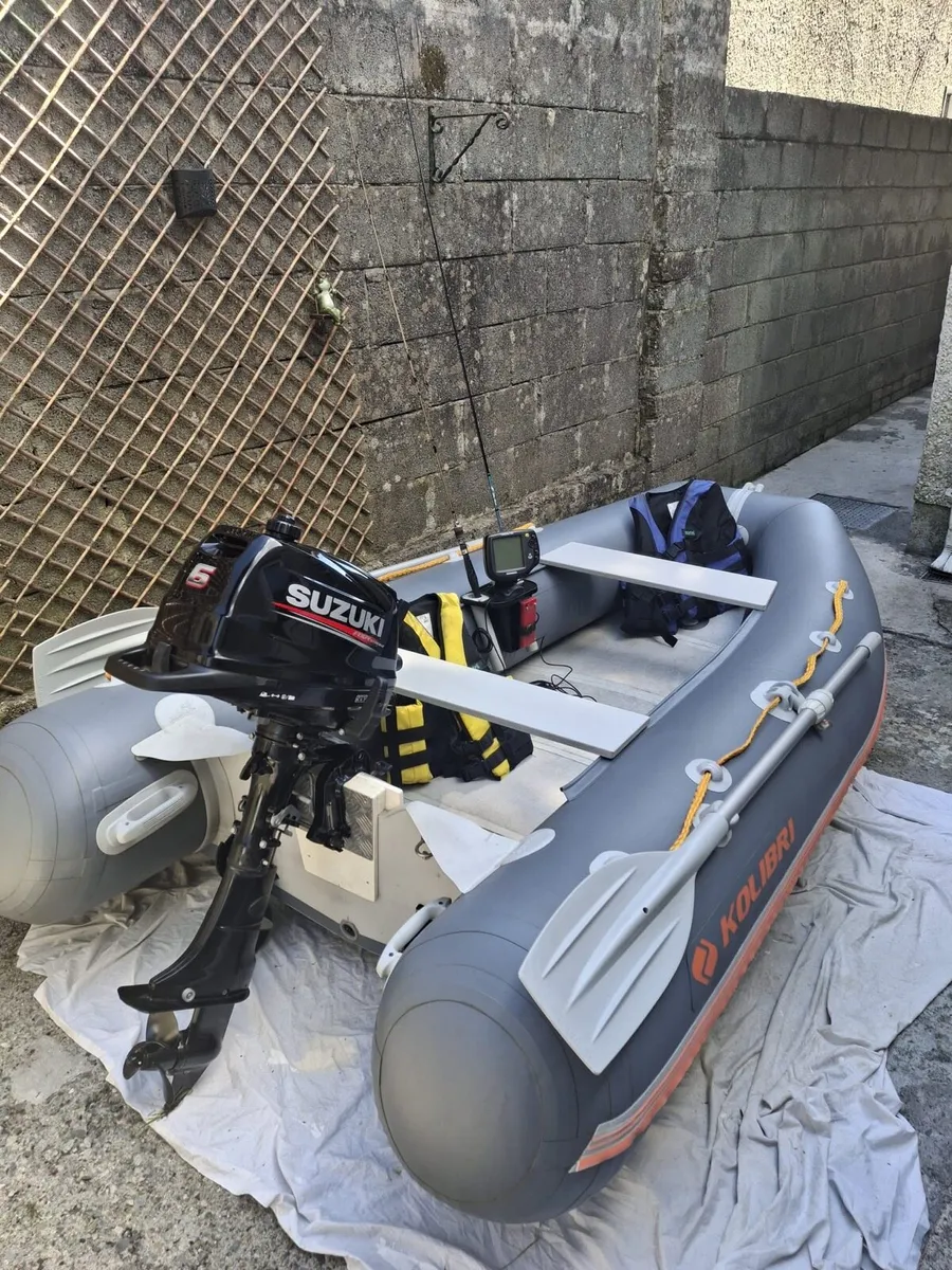 Inflatable boat with engine - Image 4