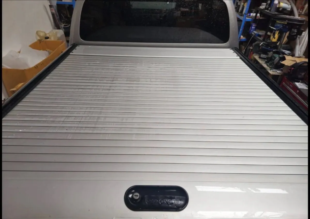 TOYOTA HILUX 2016-2026 GENUINE ROLLER SHUTTER SILV - Image 1