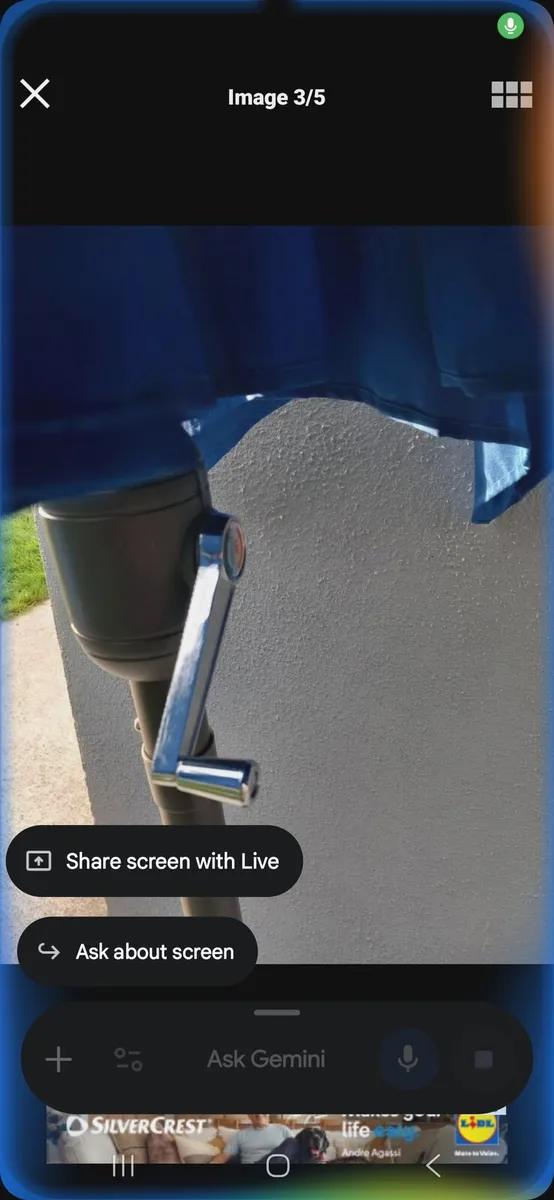 Blue parasol and concrete base - Image 1