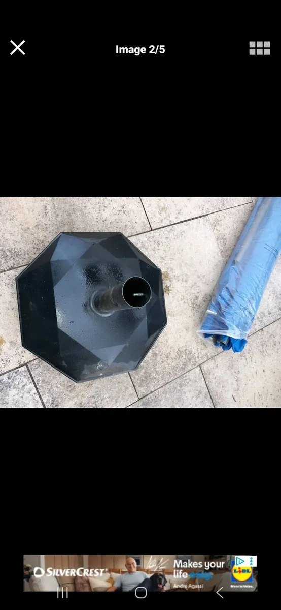 Blue parasol and concrete base - Image 4