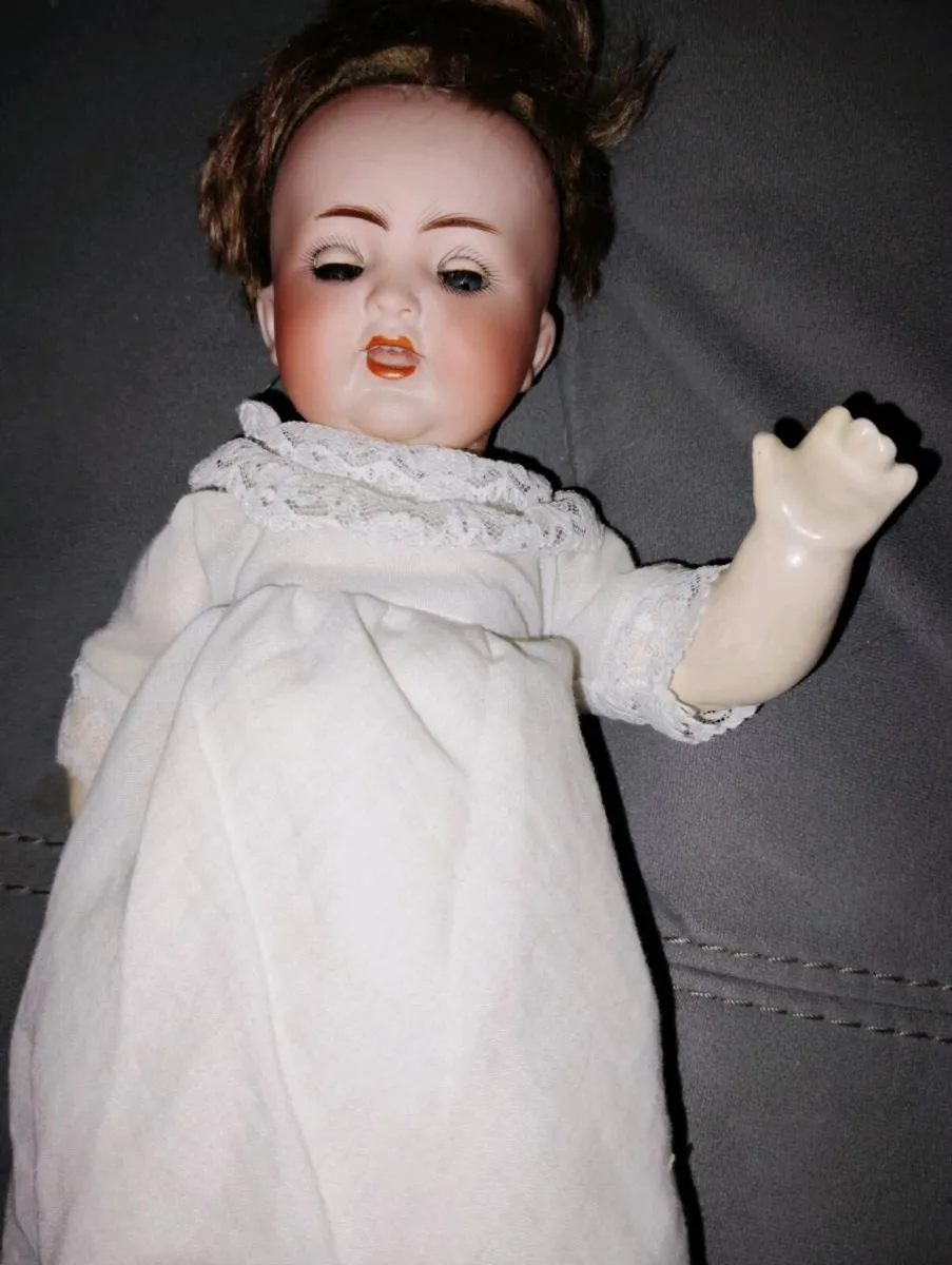 Antique doll and umbrella - Image 1