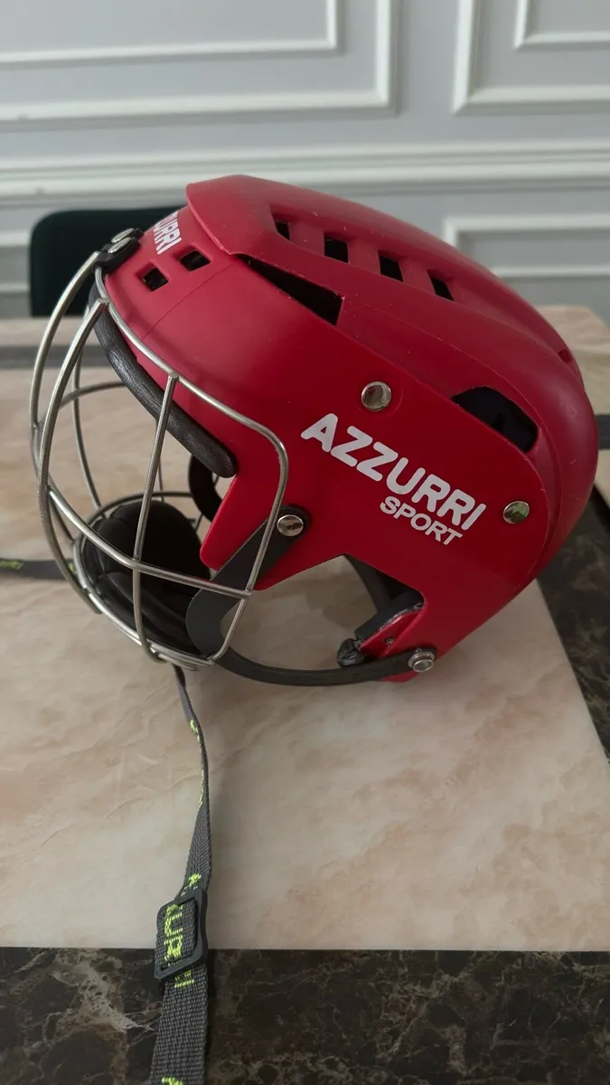 Kids hurling/camogie helmet and hurley - Image 1