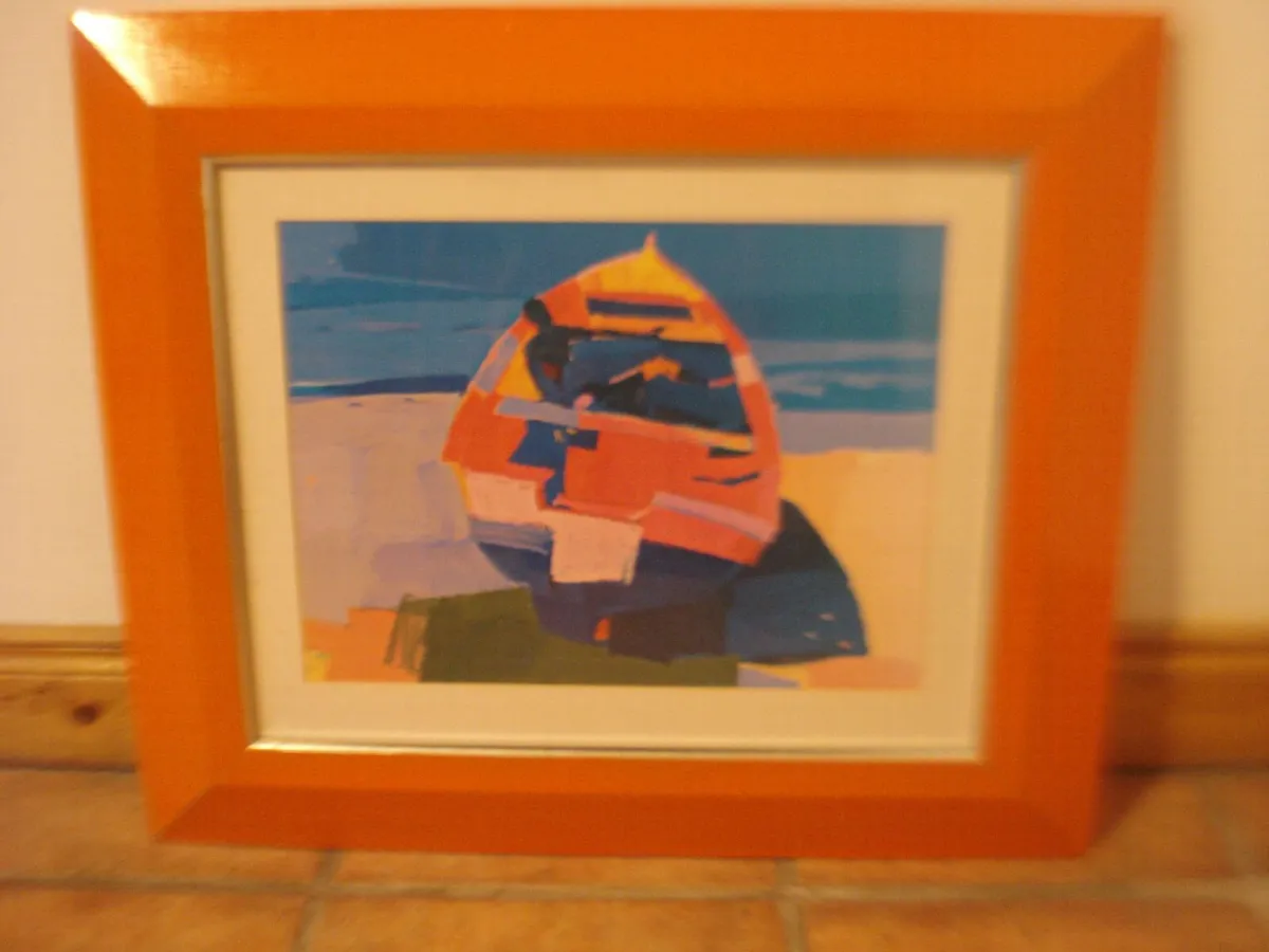 LARGE GLASS FRAMED PRINT OF BEACHED ROWING BOAT. - Image 3