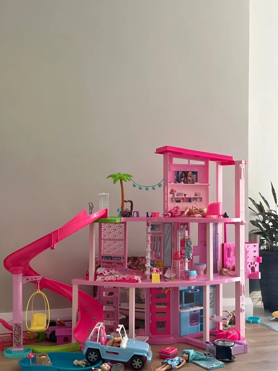 Barbie Dream House with Accessories and few dolls