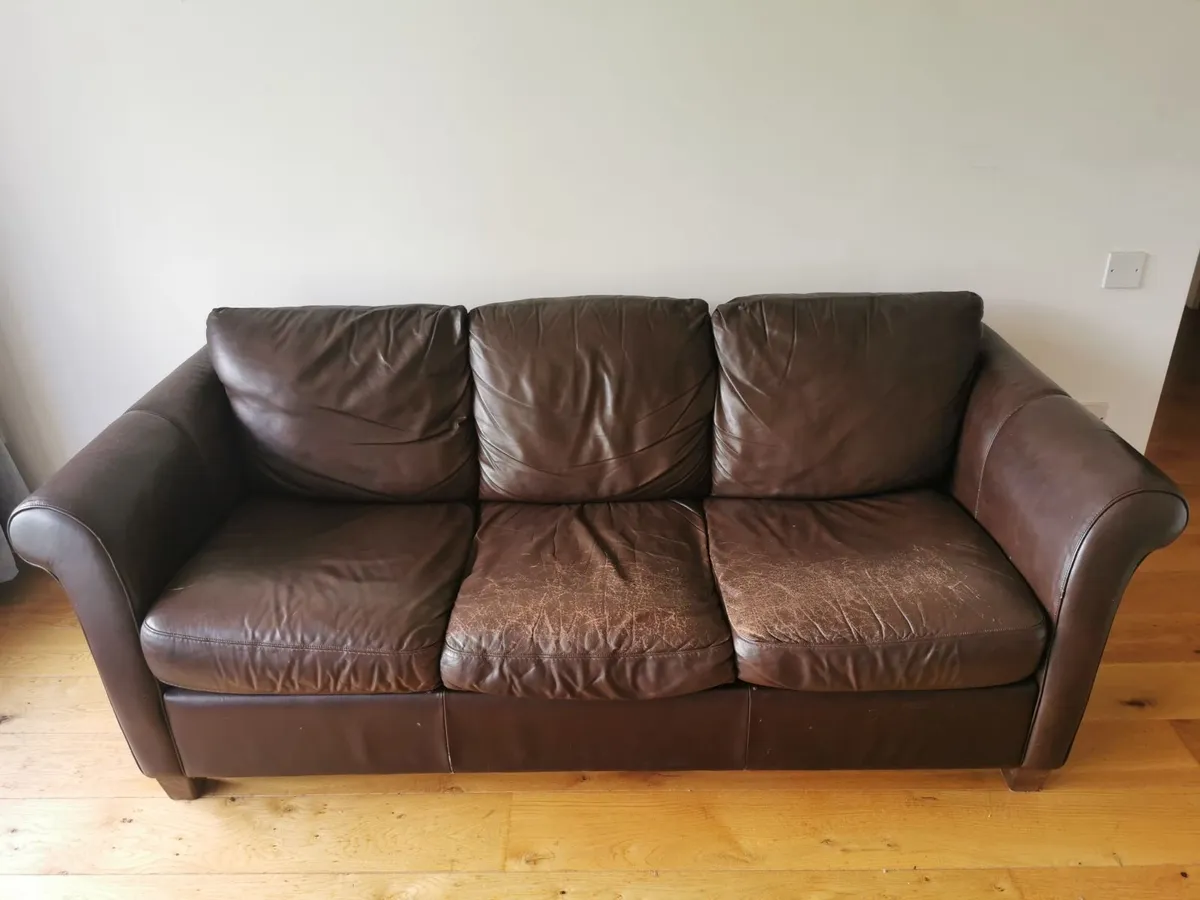 2 Leather couches (1 w/sofabed) & Pouf - Image 2
