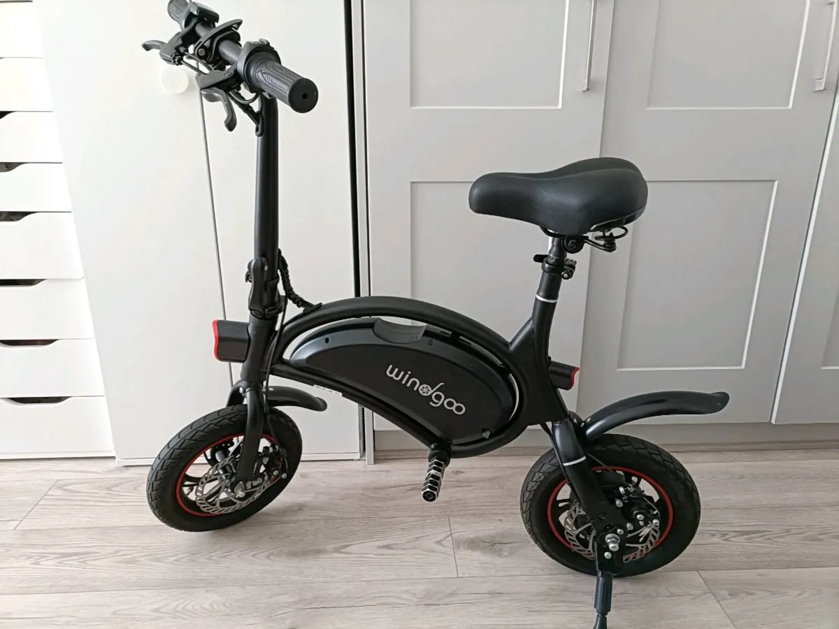 Electric bicycle windgoo perfect(new condition)+Ch - Image 1
