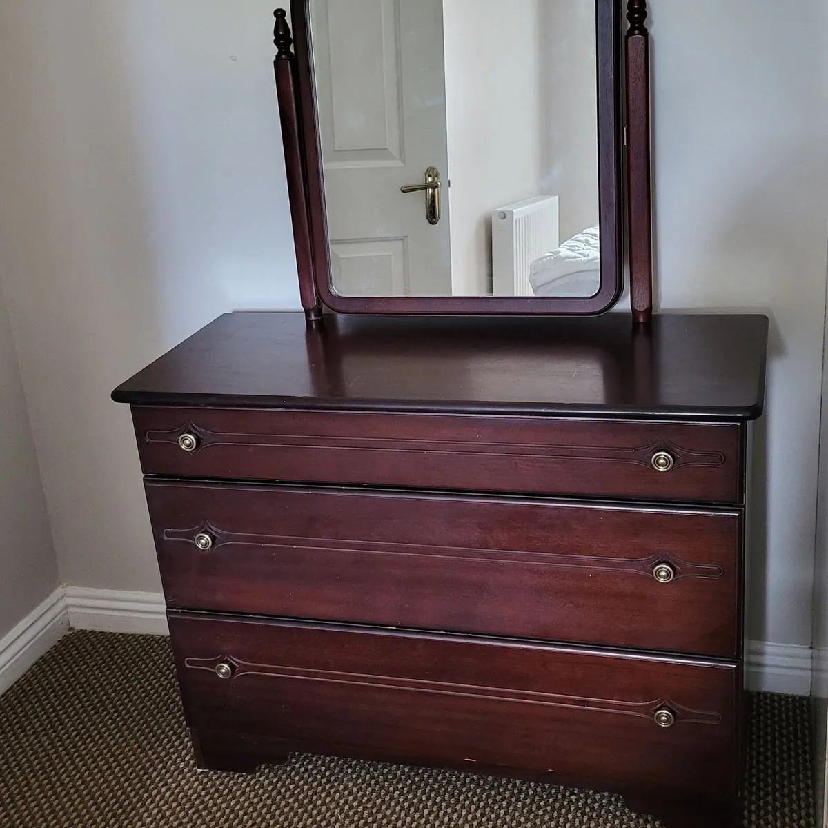 Chest of drawers with mirror