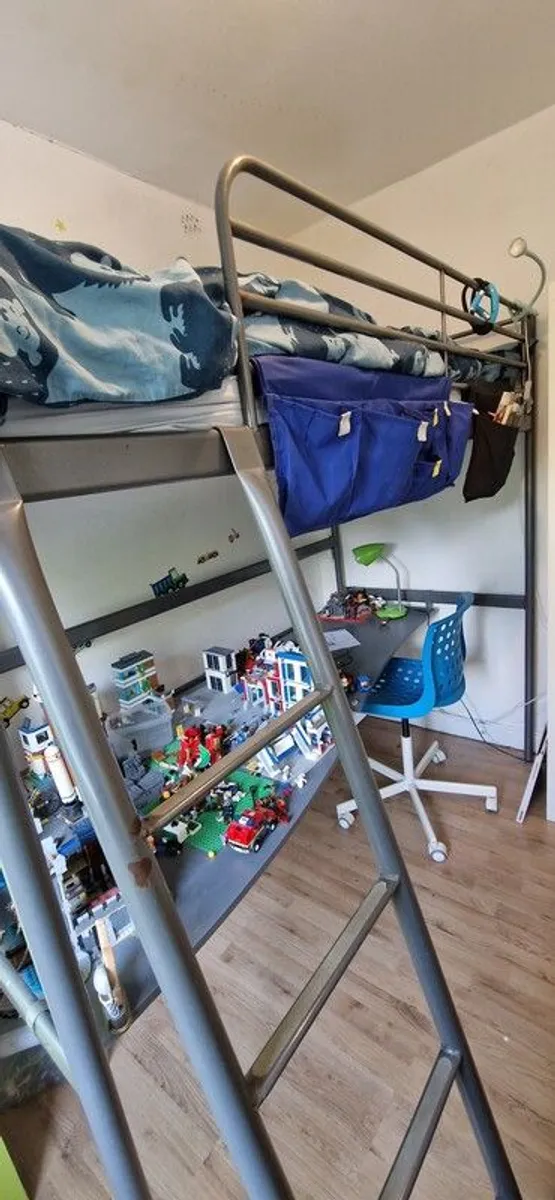 Metal framed loft bed with desk for sale. - Image 1