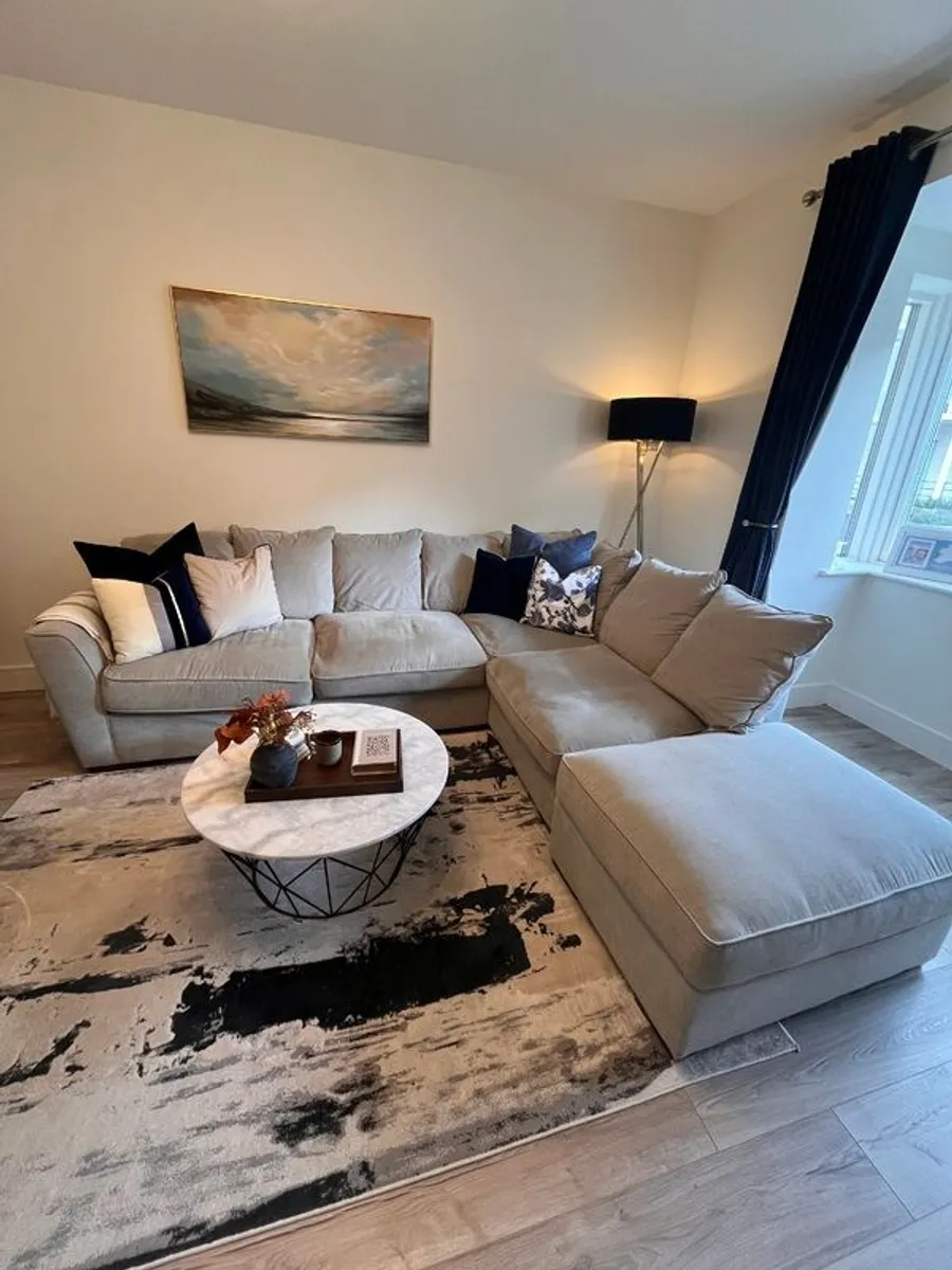 Comfortable L- shaped grey sofa - Image 1