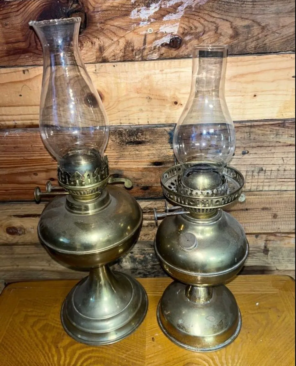 Two brass oil lamps