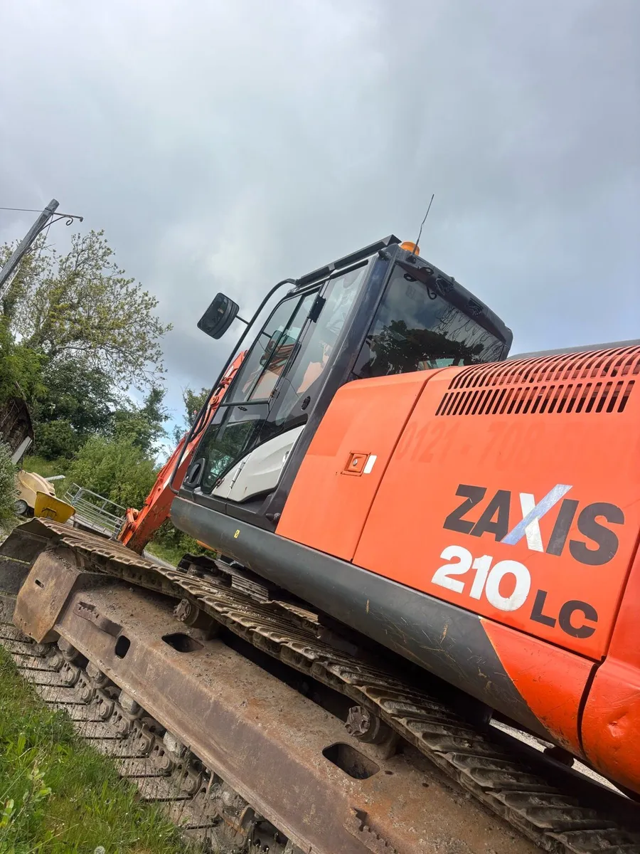 Hitachi 210 - Image 1