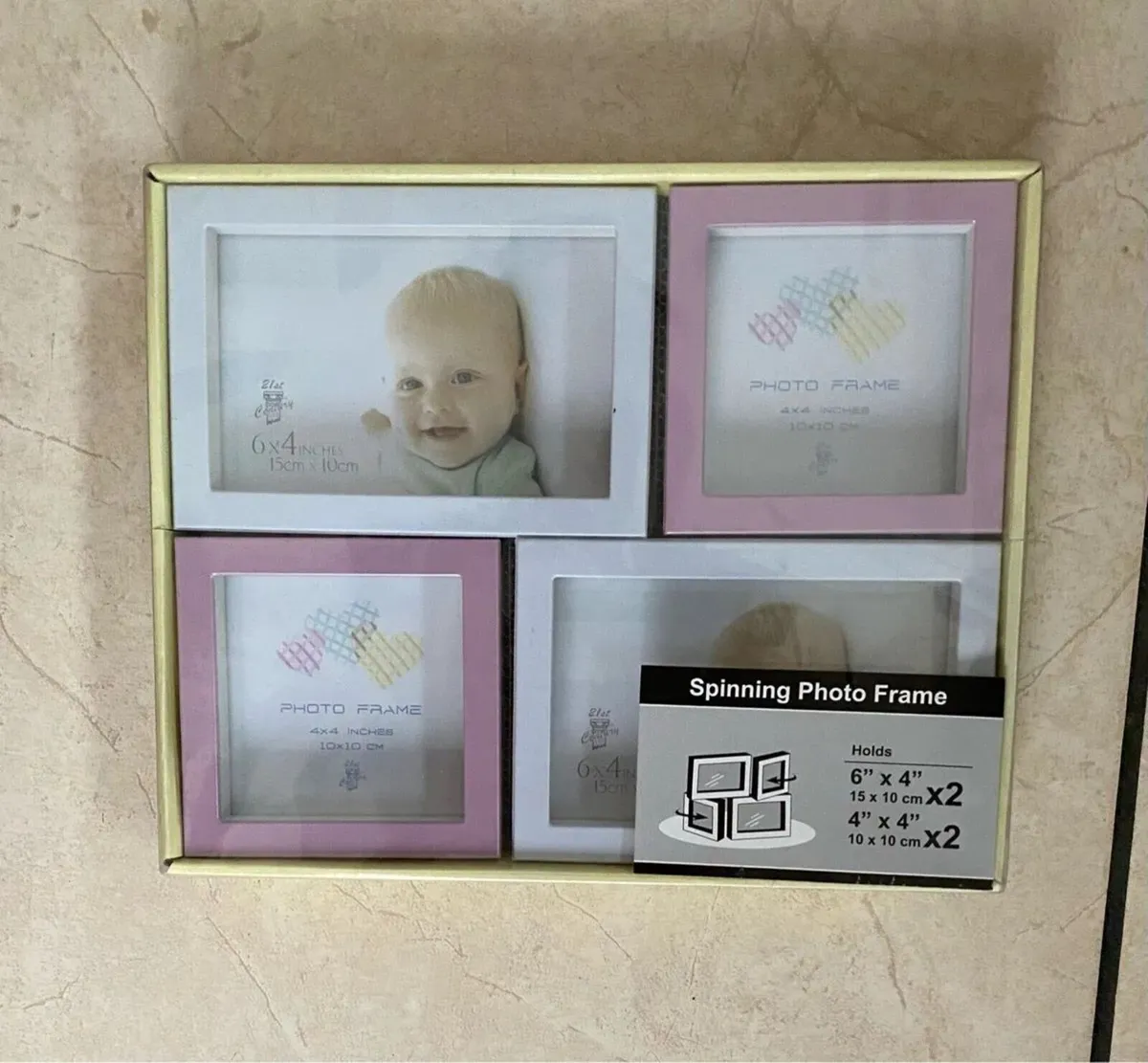 NEW SEALED Spinning Photo Frame - 4 pictures - Image 1