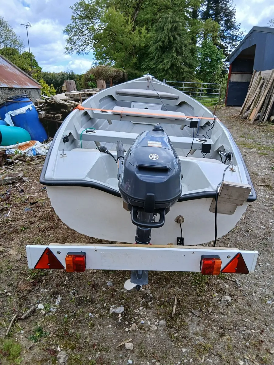14ft fibreglass fishing boat with engine and trail - Image 1