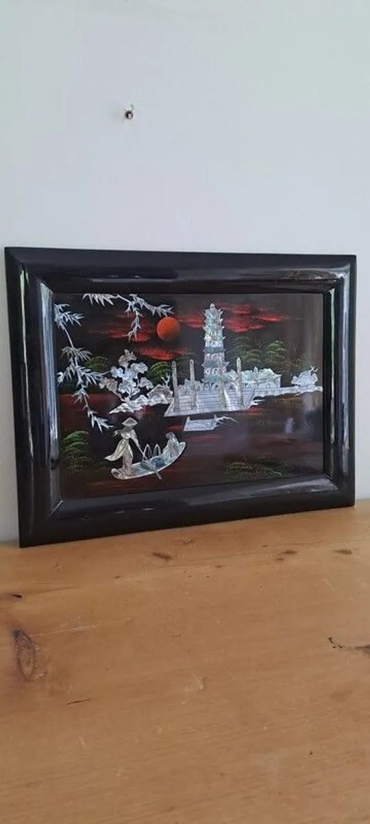 Vintage Vietnamese black lacquer wall plaque featuring intricate mother-of-pearl inlay. - Image 2