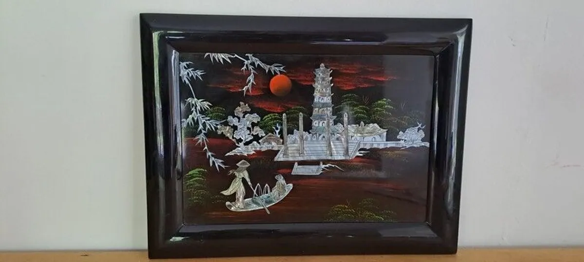 Vintage Vietnamese black lacquer wall plaque featuring intricate mother-of-pearl inlay. - Image 3