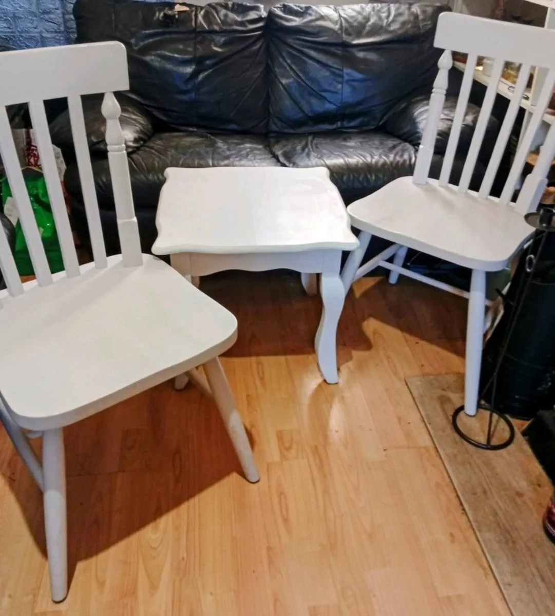 2 white kitchen chairs and white coffee table. - Image 1