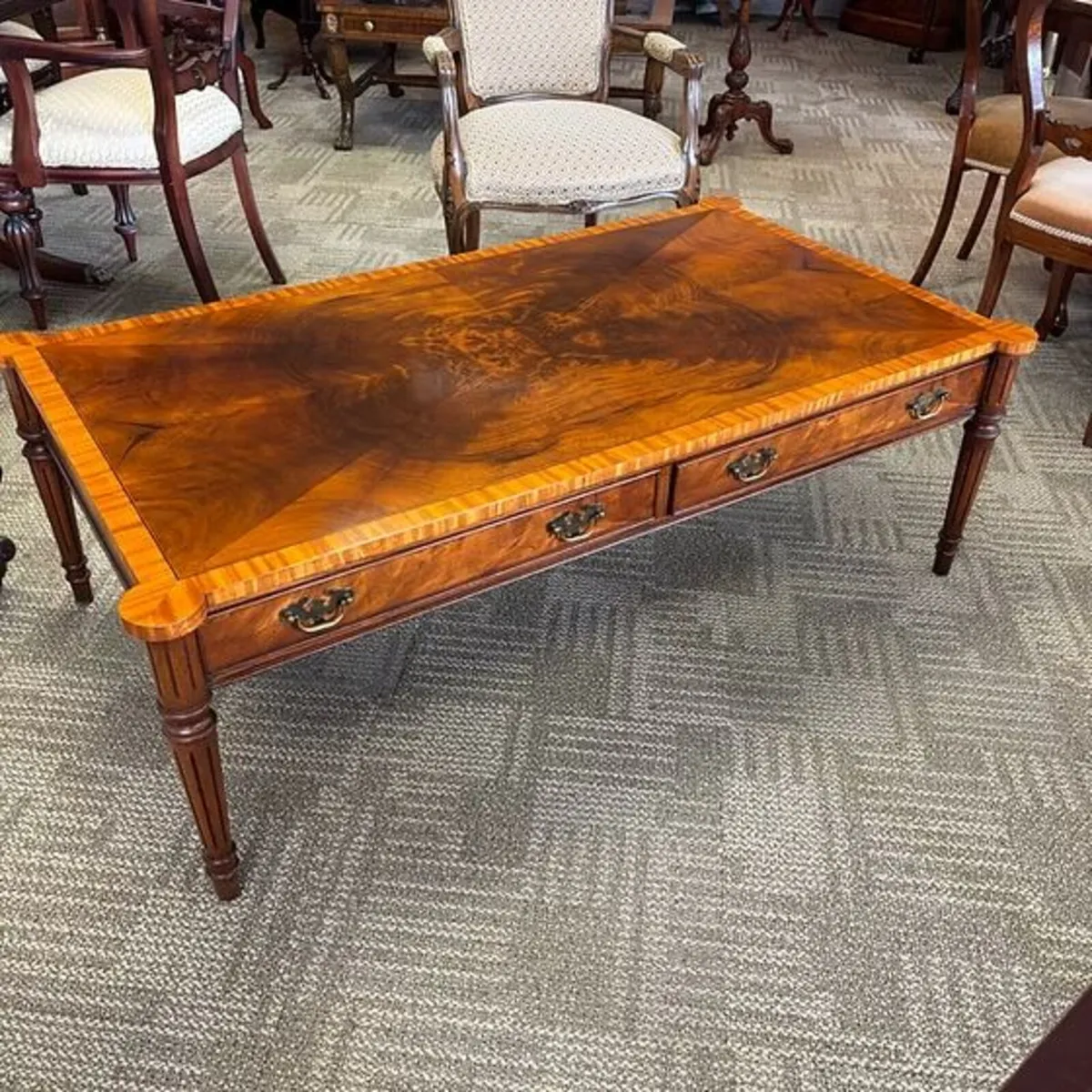 Beautiful mahogany crossband shaped coffee table o