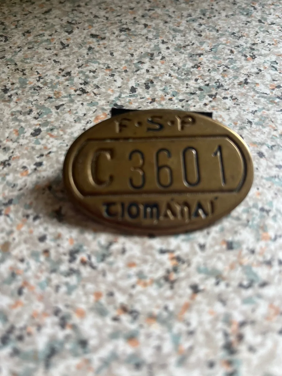 Taxi badge