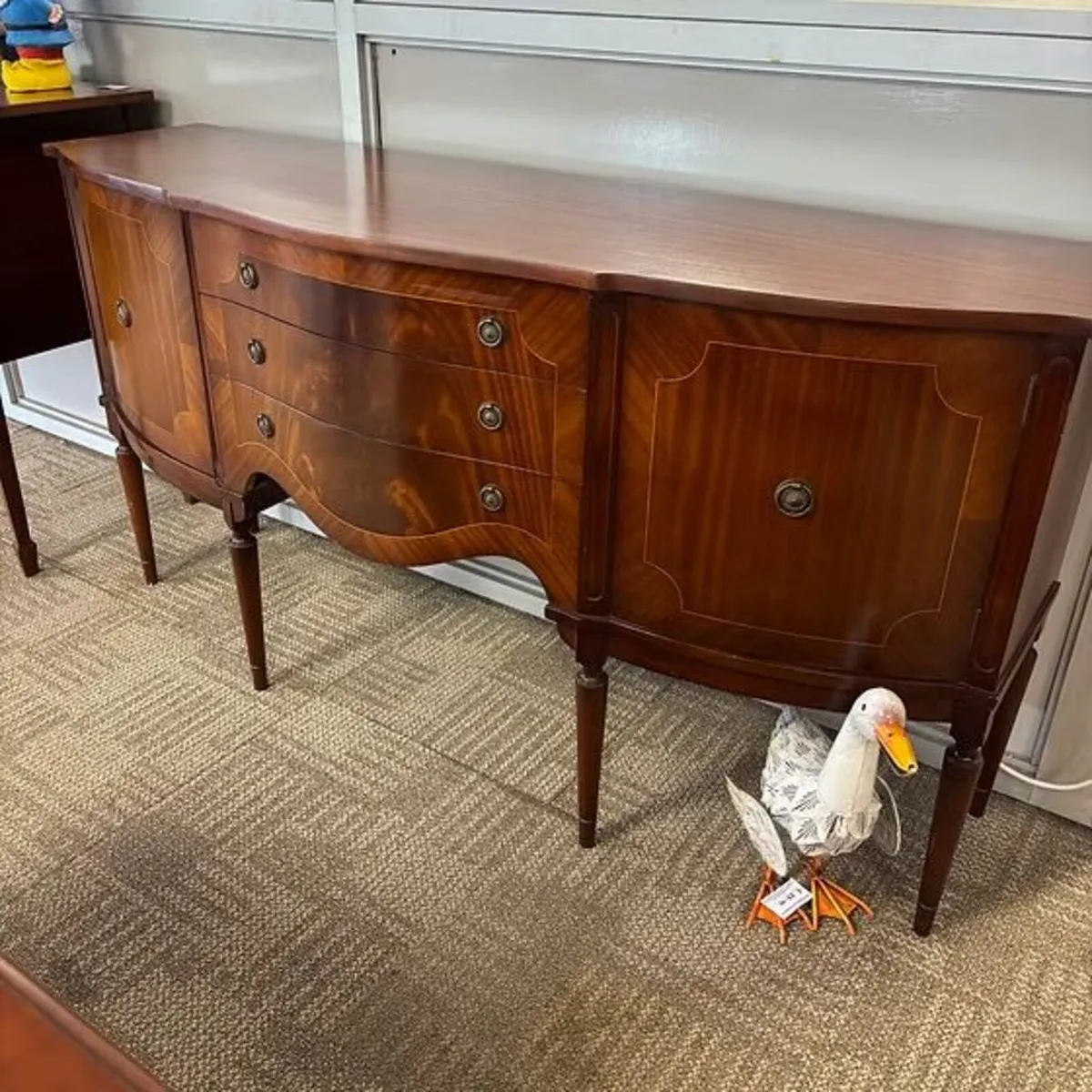Beautiful mahogany bow fronted sideboard. Enclosed