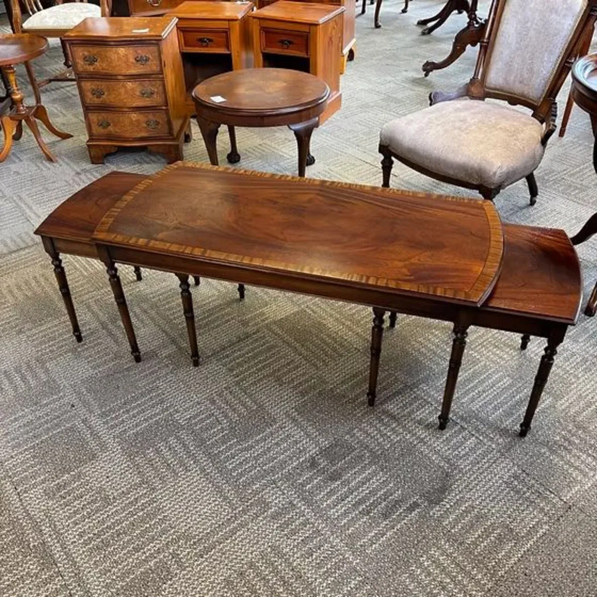 Beautiful mahogany flamed nest of three coffee tab