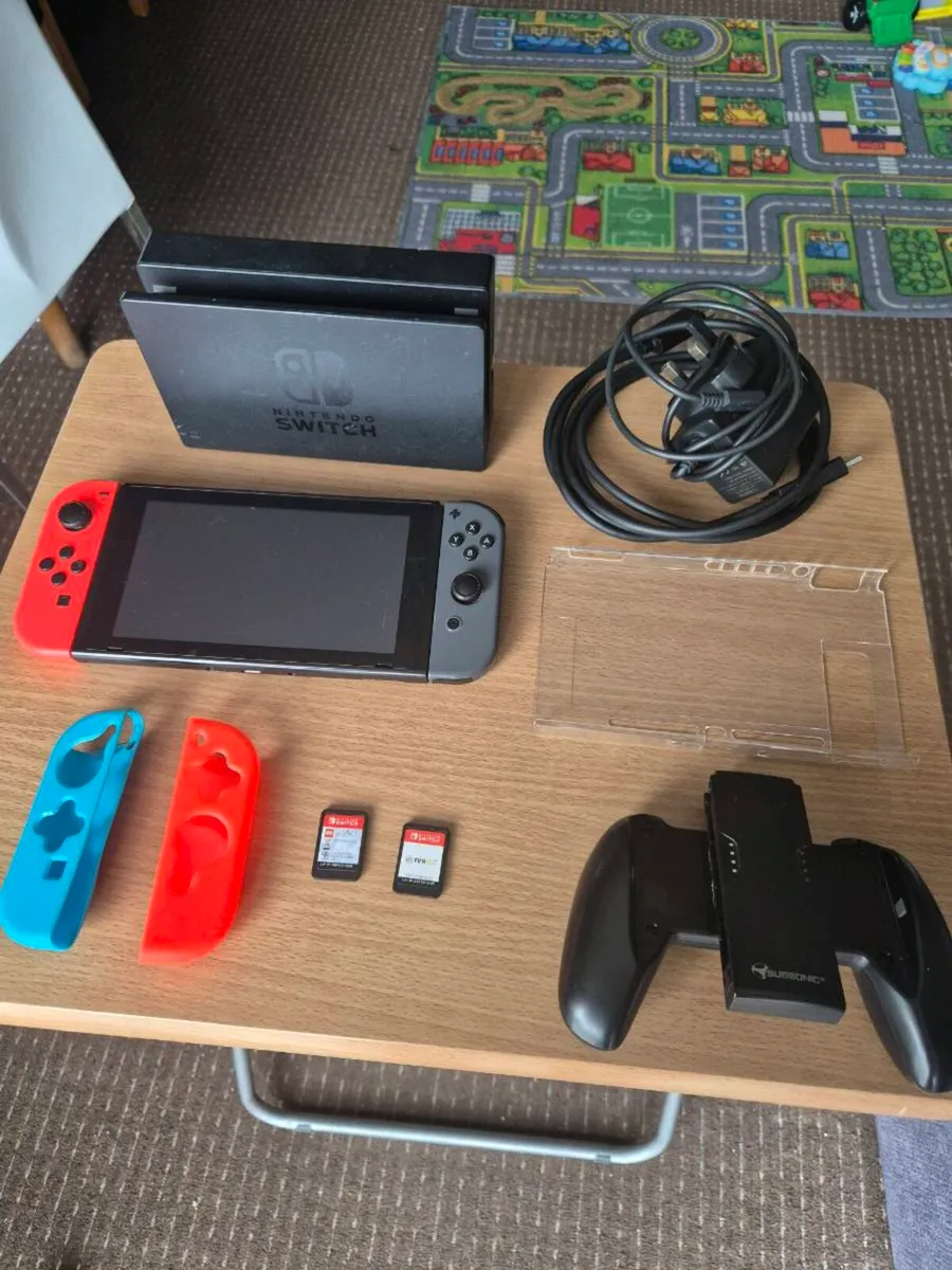 Nintendo switch + games - Image 1