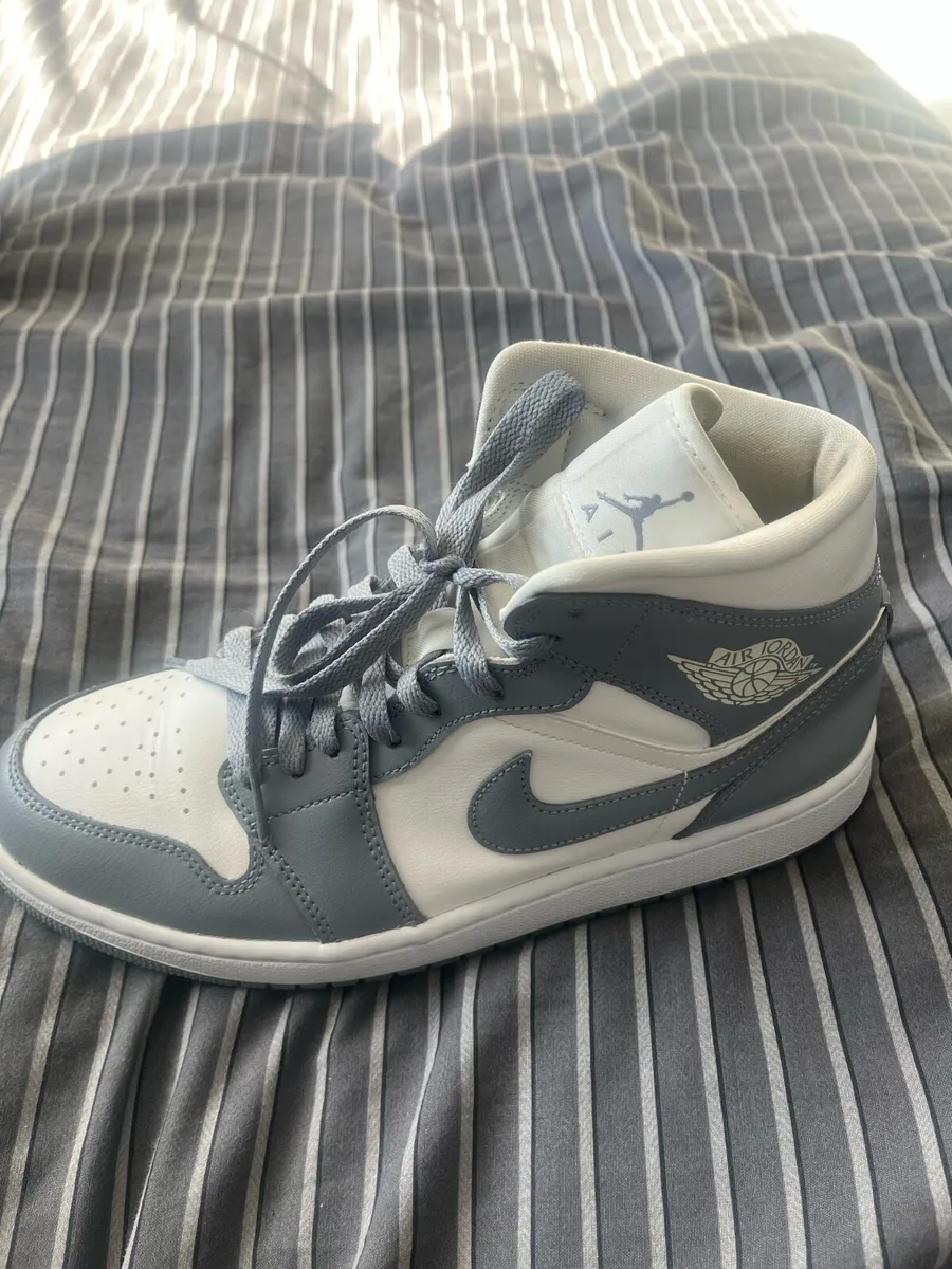 Grey and white Air Jordan 1 Mid tops - Image 1