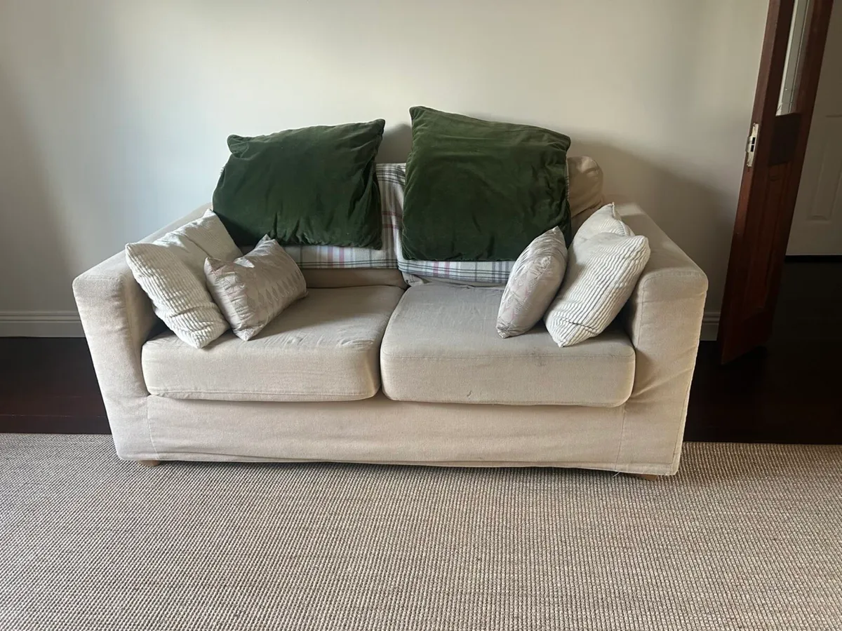 Beige two person sofa - Image 1