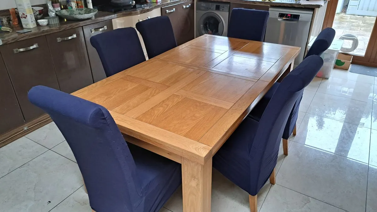 6-8 seater dining table and 6 chairs - Image 1