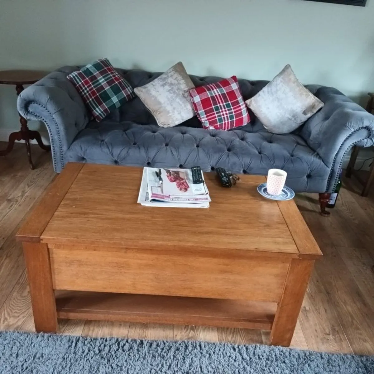 2 sofas, 1 grey and 1 teal. - Image 1