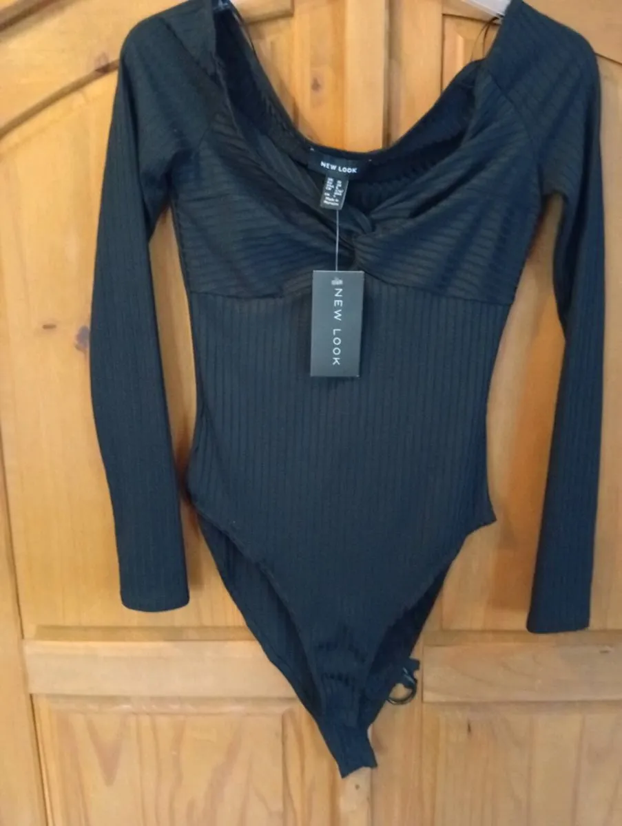 Ladies tops and bodysuits size 10 - Image 1