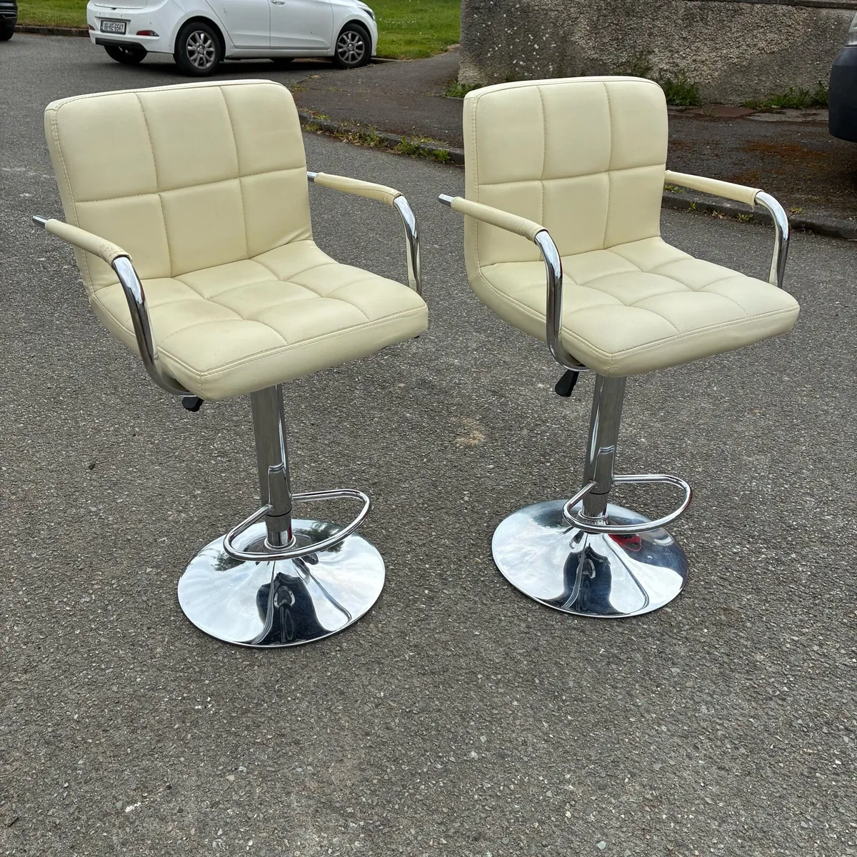 Two Adjustable, Swivel Cream Leather High Chairs - Image 1