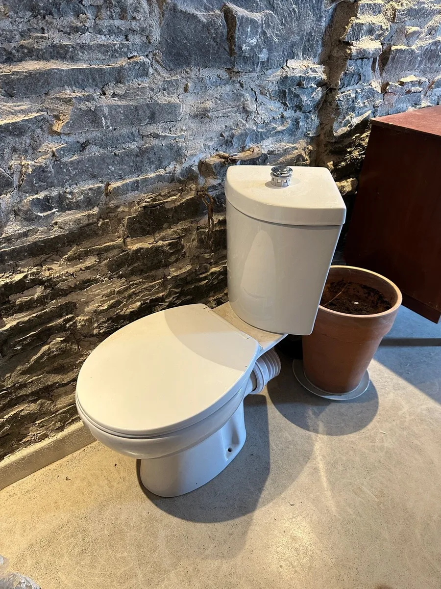 Brand new never used corner toilet - Image 1
