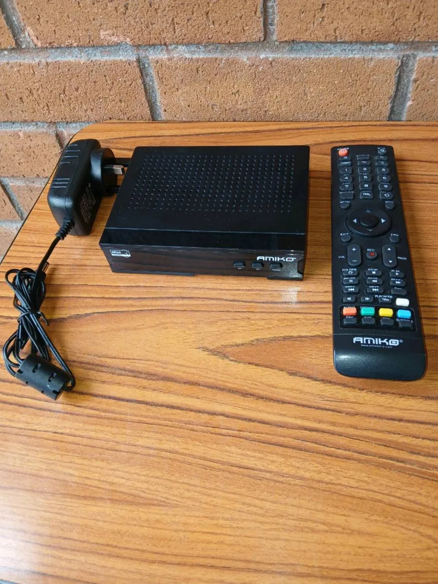 Amiko free to air combo box with remote control. - Image 1