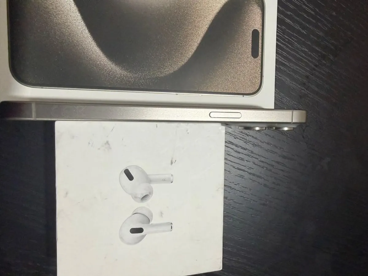 iphone 15 pro max natural titanium 256gb  mint condition and genuine apple airpods - Image 3