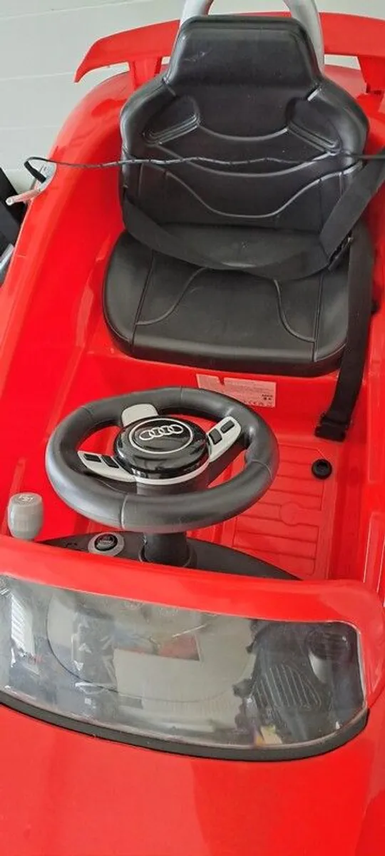 kids electric car with charger - Image 1
