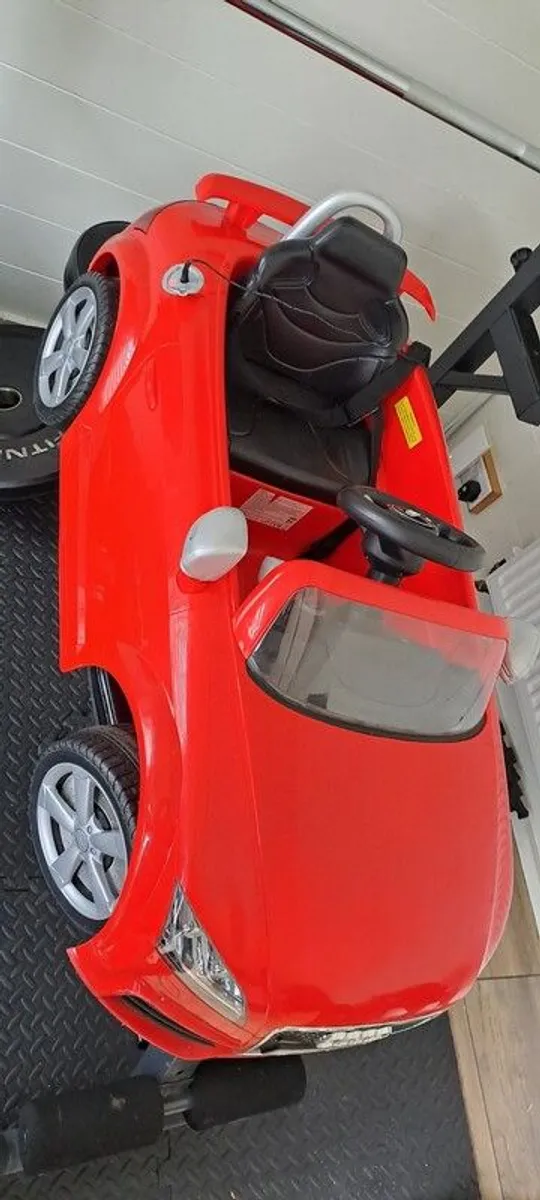 kids electric car with charger - Image 4