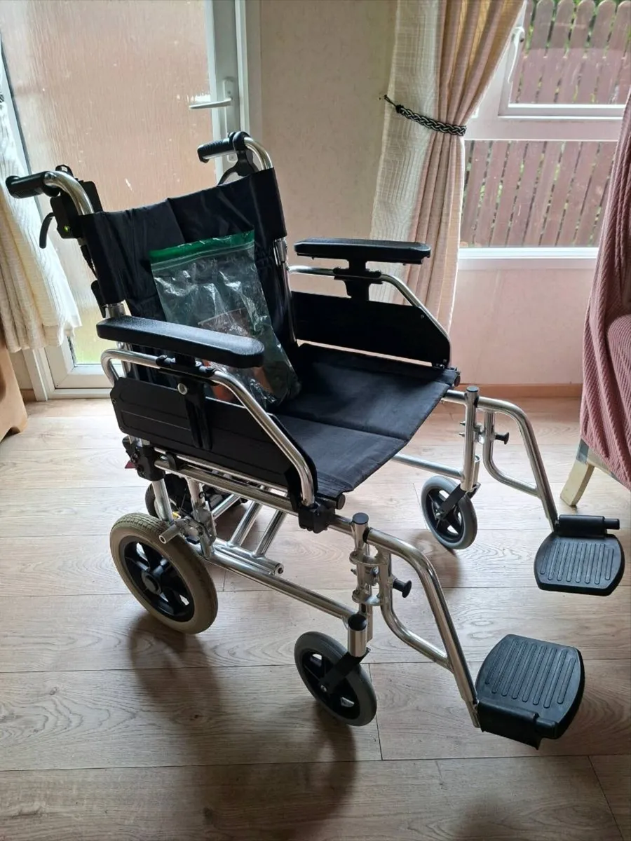 Transit wheelchair and power pack - Image 1