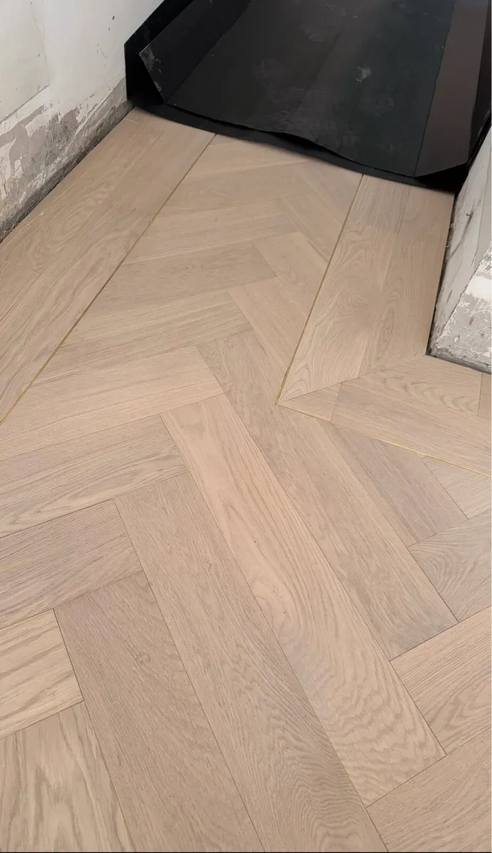 Timber Herringbone flooring - Image 1