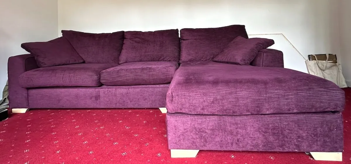 Purple L-shaped couch with right chaise - Image 1