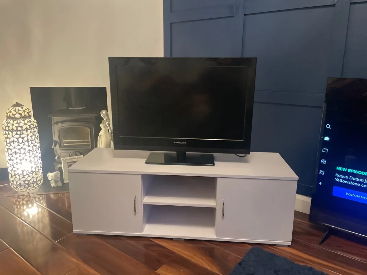 Tv and tv cabinet - Image 1