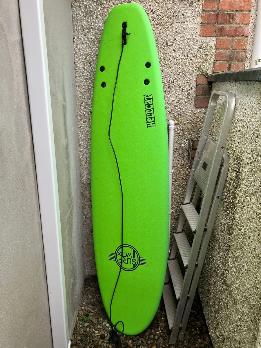 surfboard / wetsuit - Image 1