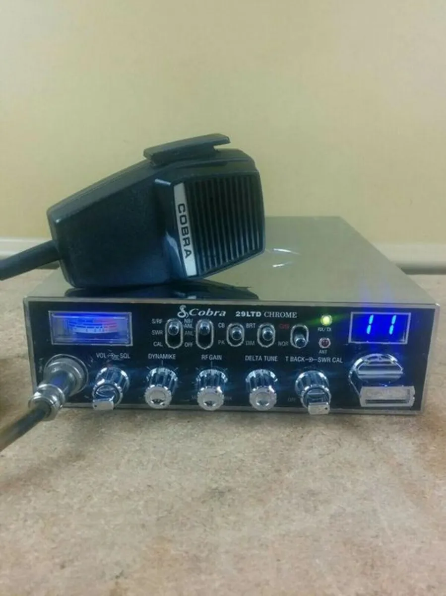 cb radio and magnetic car aerial mount.