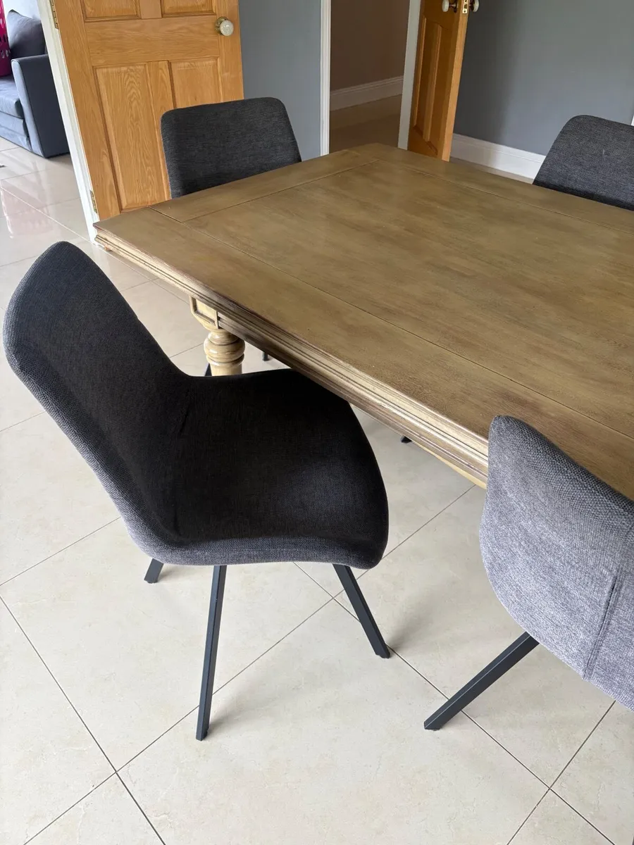 Large wooden table and 6 swivel chairs - Image 4